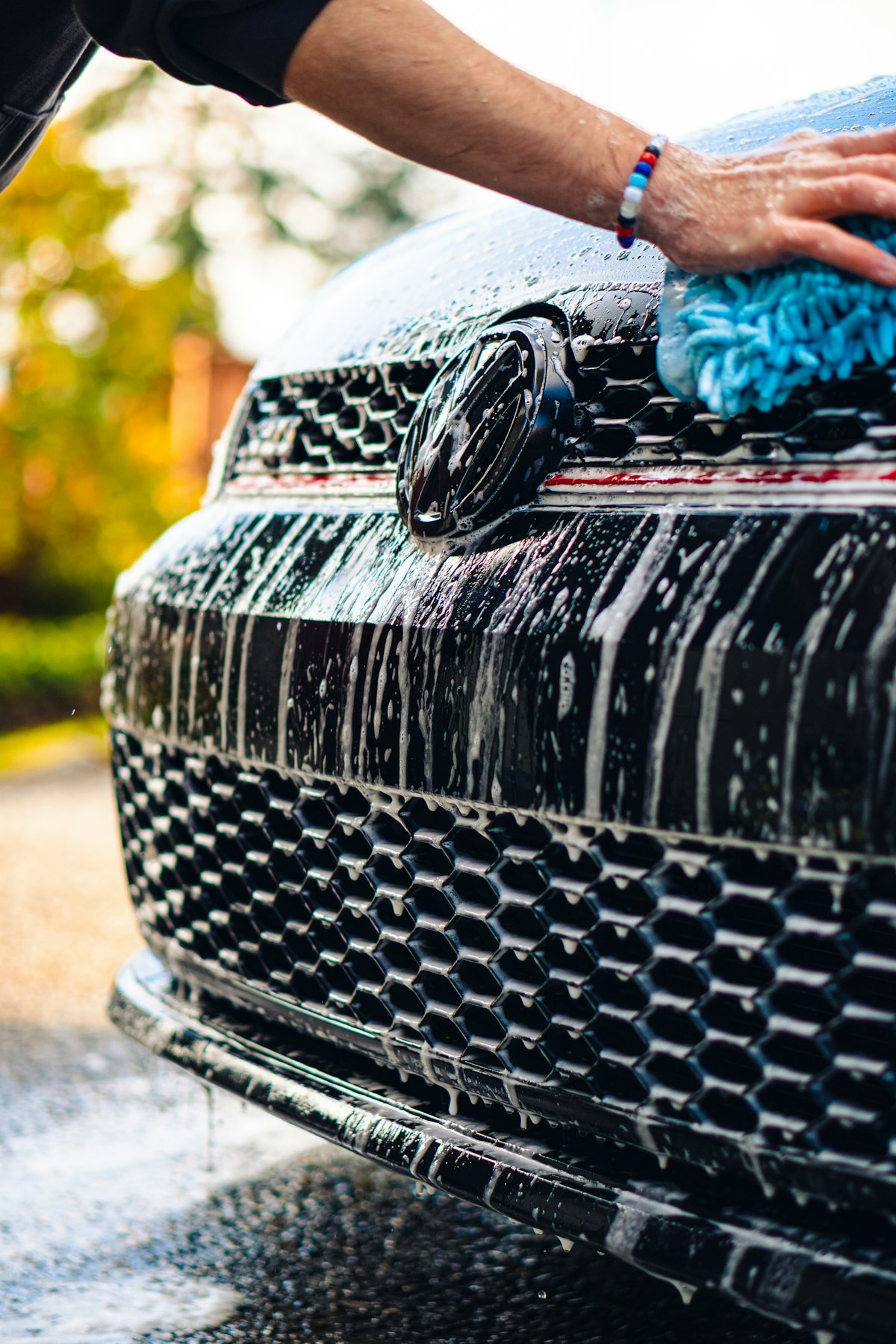 Careful hand washing of a car’s exterior